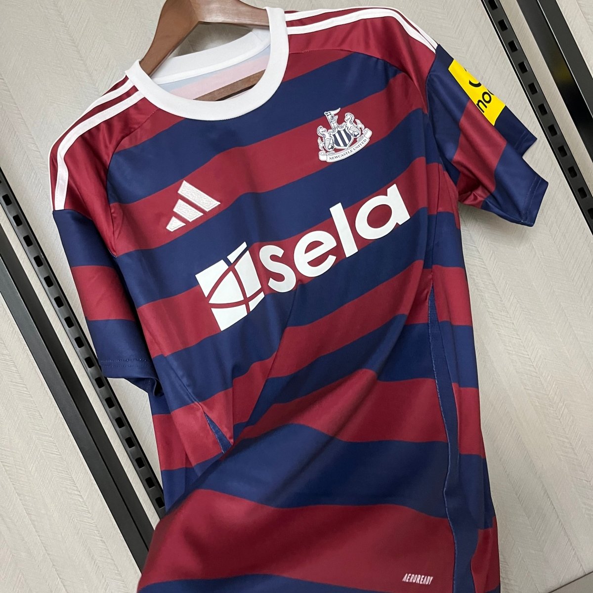 Camisa Newcastle United 24/25 Azul e Vermelha