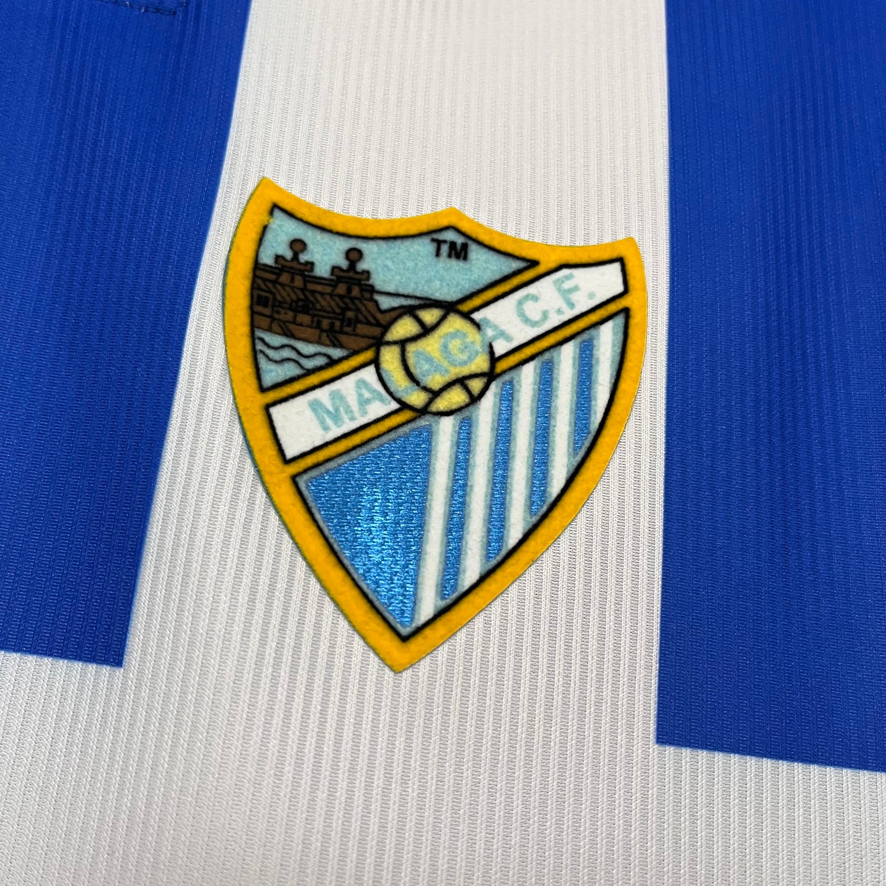 Camisa do Málaga I 2025  -Branca e azul