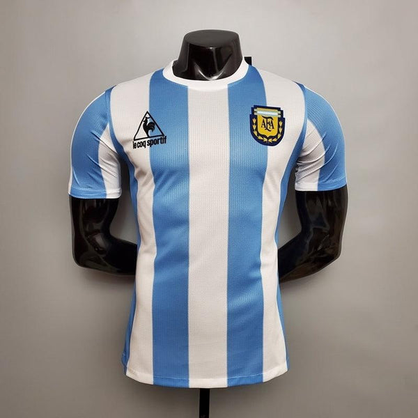 Camisa Argentina Retrô 1986 Azul e Branca - Le Coq Sportif Camisa Argentina Retrô 1986 Azul e Branca - Le Coq Sportif