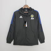Corta - vento Manchester United 21/22 Adidas - Preto e Azul - DA Sports Oficial